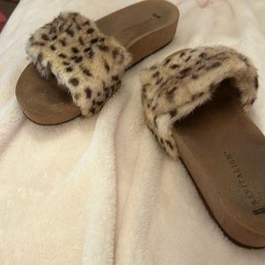 Revitalign leopard fur slipons. Very comfortable. Lots of use left.